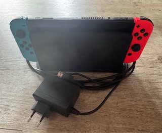 Nintendo Switch OLED + Mando Extra
