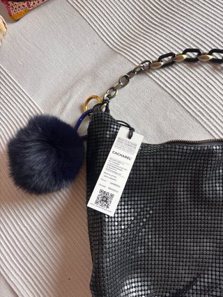 Bolso de noche Cacharel negro y dorado