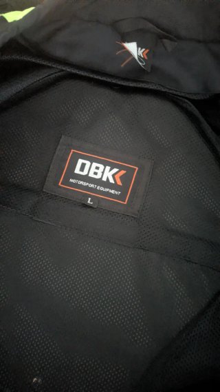 Chaqueta de moto negra y verde