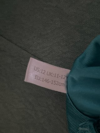 Maillot gimnasia niña azul y negro con pedreria