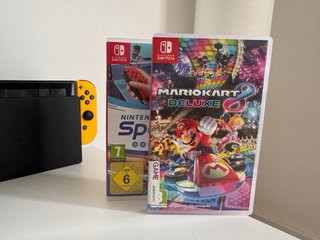 Nintendo Switch + Mario Kart 8 + Sports