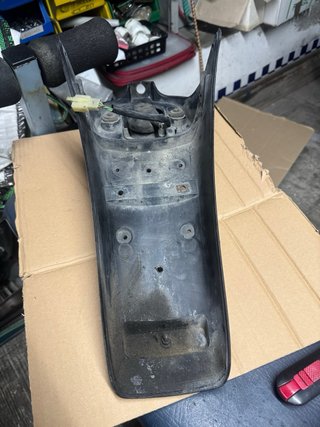 Portamatricula y piloto Honda Scoopy 50/100