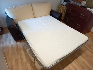Sofá cama Suinta en tela y cuero