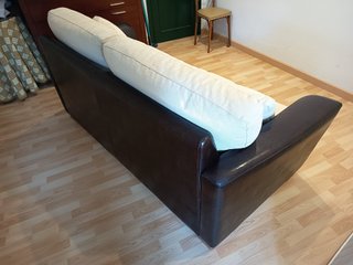 Sofá cama Suinta en tela y cuero
