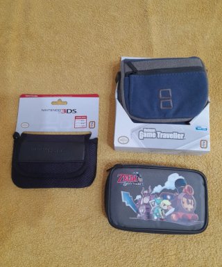 NUEVO. Lote Fundas Oficial Nintendo + protectores