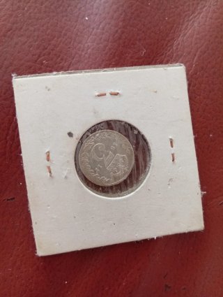Monete in argento di George V e Roosevelt