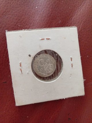 Monete in argento di George V e Roosevelt