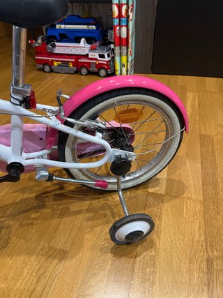 Bicicleta infantil Btwin rosa y blanca