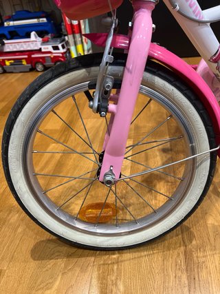Bicicleta infantil Btwin rosa y blanca