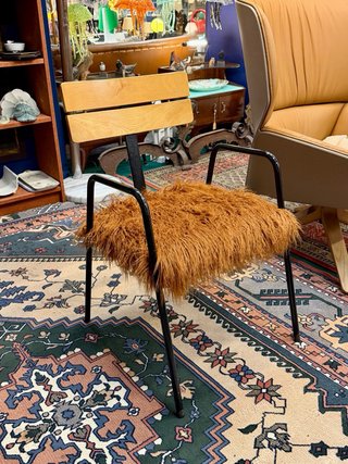 Sedia vintage impilabile con braccioli