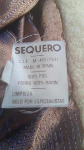 Chaqueta de piel con cuello borrego