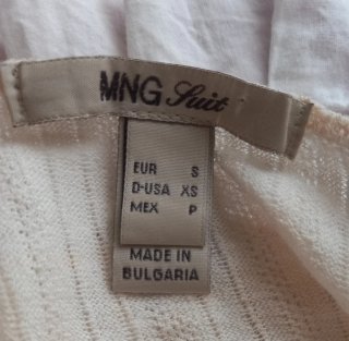 Blusa blanca con volantes
