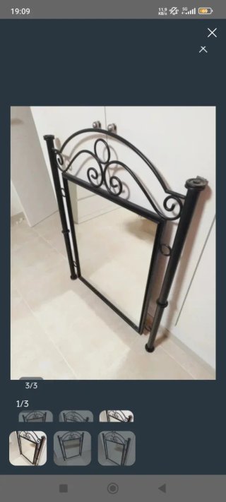 Espejo de metal imitación a forja. 109 por 78