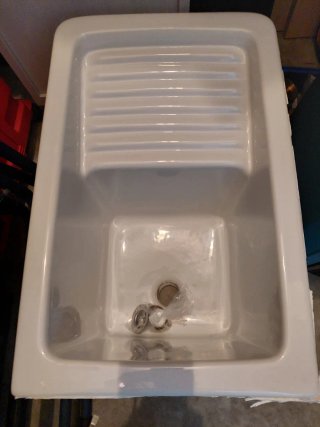 Pila de lavadero blanca
