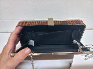 Bolso de mano clutch Benini nuevo