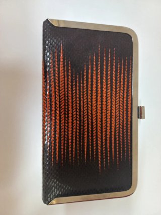 Bolso de mano clutch Benini nuevo