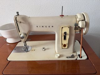 Máquina de coser Singer manual Viene con la mesa