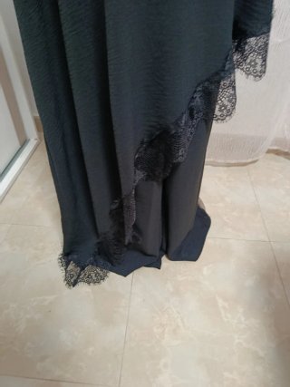 Conjunto negro asimétrico con encaje
