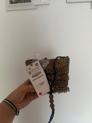 Bolso de fiesta Zara con flecos dorados
