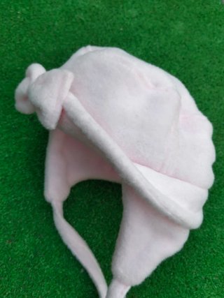 Gorro de bebé rosa con lazo