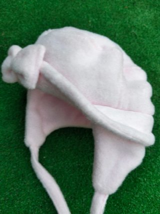 Gorro de bebé rosa con lazo
