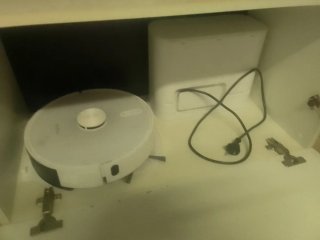 Robot aspirador blanco