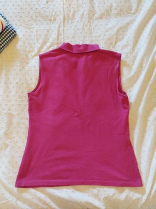 Polo sin mangas rosa Lacoste
