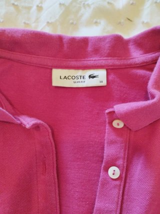 Polo sin mangas rosa Lacoste