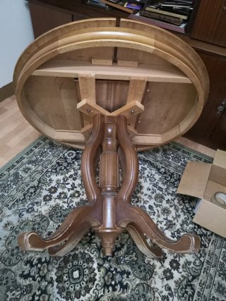 Mesa de comedor redonda de madera