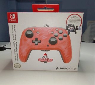Mando PDP Faceoff Deluxe Audio Switch Rojo