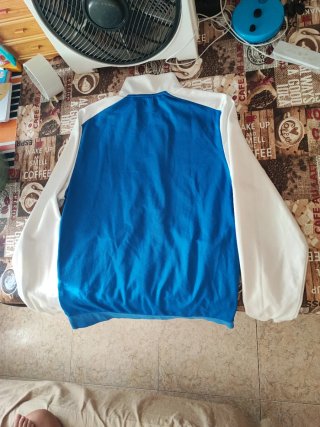 Chaqueta deportiva Lacoste azul y blanca original