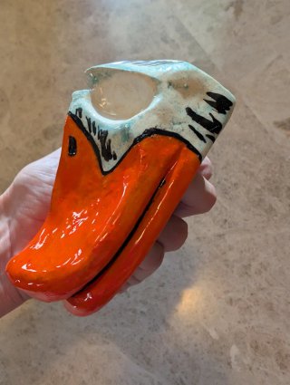 Apoya gafas de pato