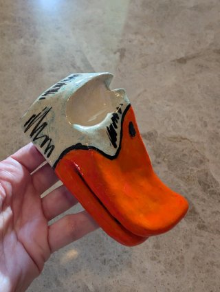 Apoya gafas de pato