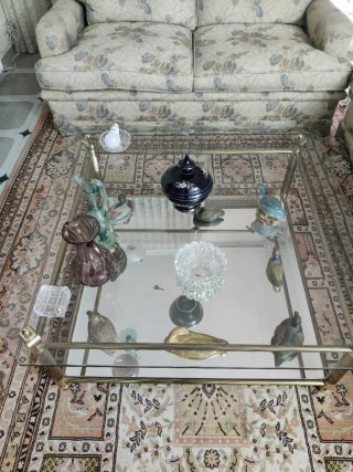 Mesa de centro cristal y metal dorado