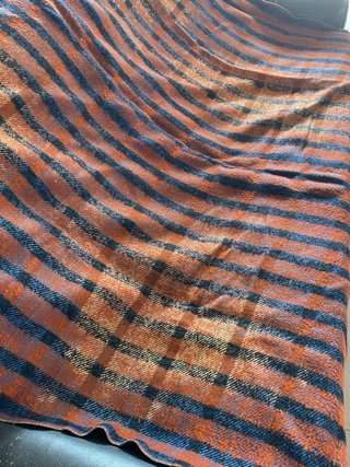 Coperta a righe arancioni e blu