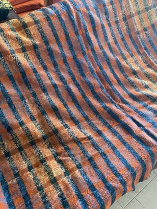 Coperta a righe arancioni e blu