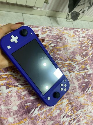 Nintendo Switch Lite Viola + Caricabatterie