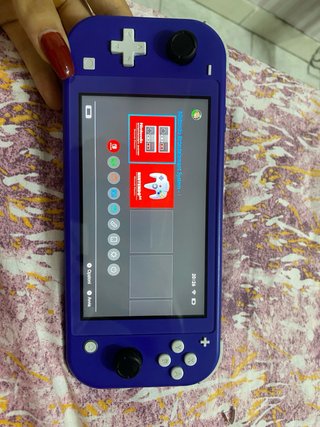 Nintendo Switch Lite Viola + Caricabatterie