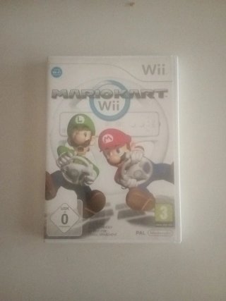 Console Nintendo Wii con sei giochi e tavola Wii Fit