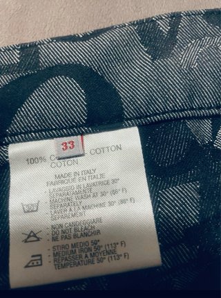 Pantalones Versace con logo