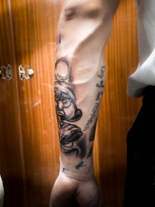 Tatuaje N#191 personaje con gafas
