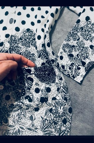 Chaqueta de punto blanco y negro
