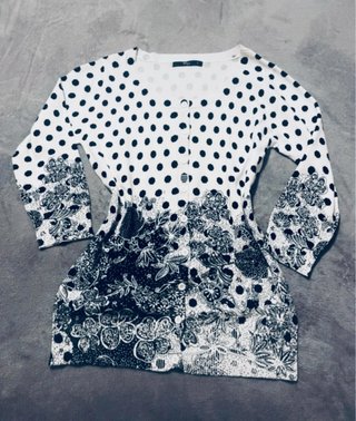 Chaqueta de punto blanco y negro