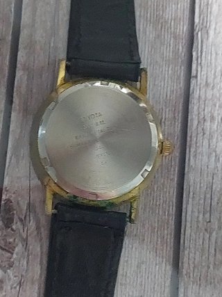 Reloj Rolex Quartz Negro Dorado