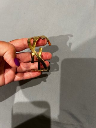 Bracciale rigido Yves Saint Laurent oro