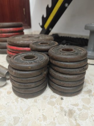 Mancuernas y discos de pesas