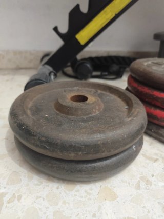 Mancuernas y discos de pesas