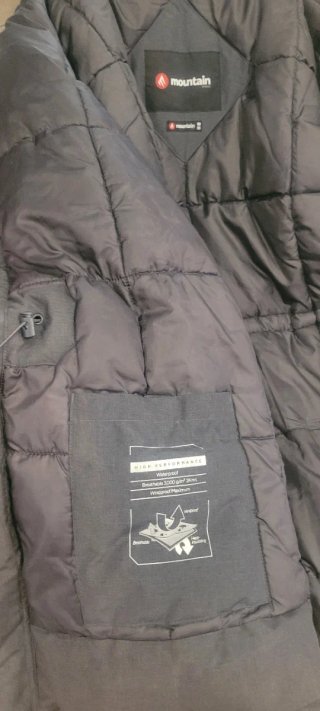 Abrigo Mountain Pro gris Talla M