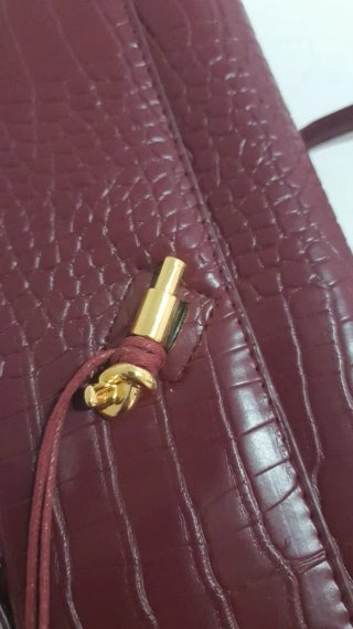Bolso de mano tipo clutch con correa