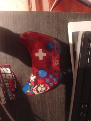 Mando Nintendo Switch Mario Transparente Rojo